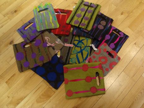 Picture of handmade felt bags made by Trixie Flory