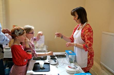 Picture of Sarah Ditchfield running a candle making workshop